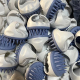 Différents coloris disponibles de la brosse massage
